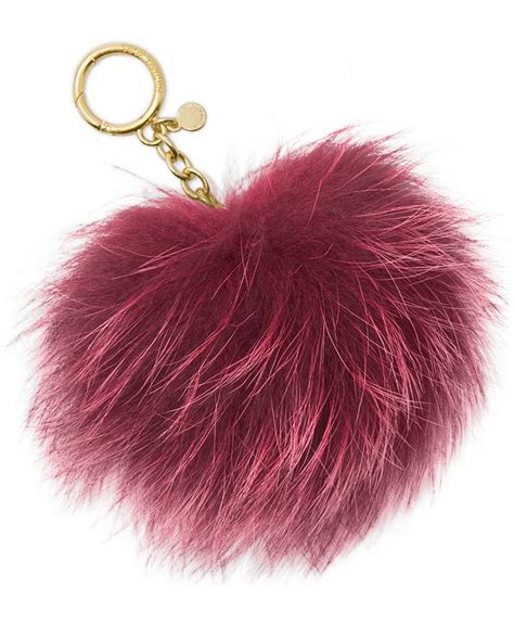 pompon sleutelhanger michael kors|Pom.